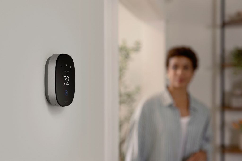 An ecobee thermostat installed on a wall